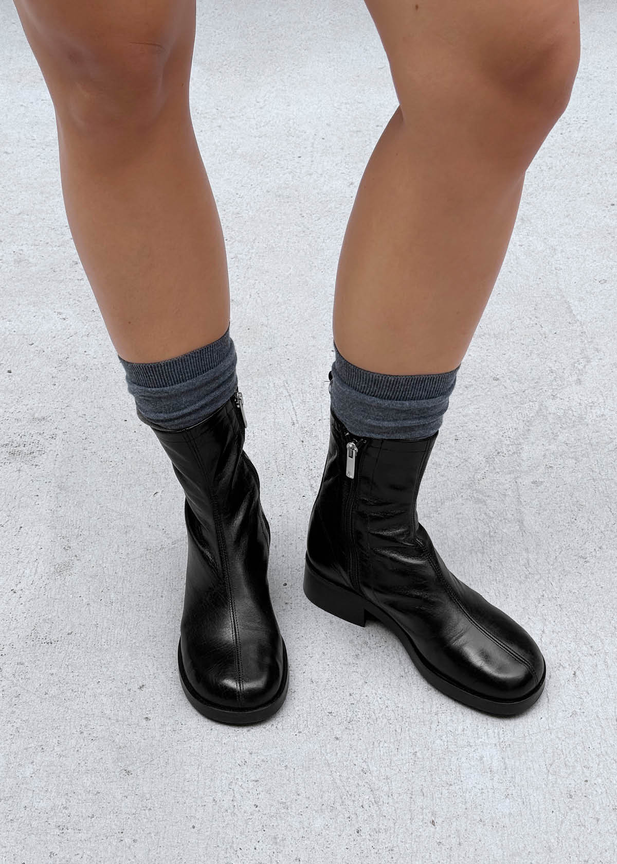Niam Rift Black Leather Ankle Boots